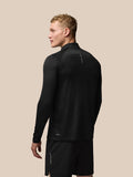 Back view of black Adapt Training 1/4 Zip Top showing geometric pattern and Castore branding on the upper back.