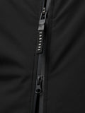 Zipper close-up on the black jacket with Castore pull and ProTek branding visible at the cuff area