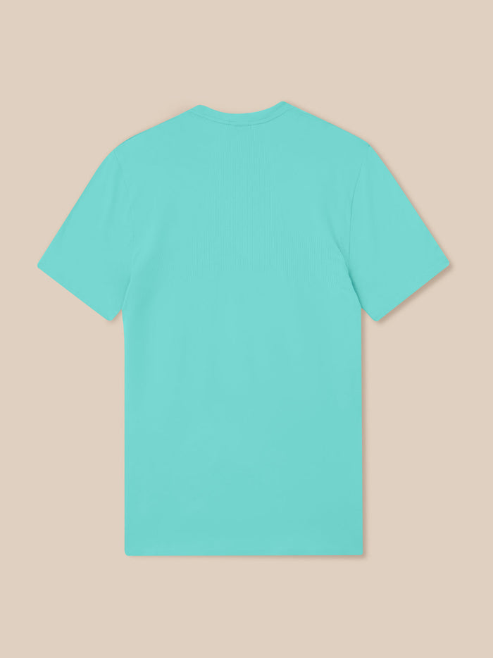 Back view of Zone Training T-Shirt in Light Aqua showing ribbed panel and curved hem