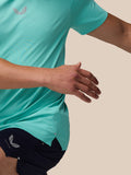 Close-up of left chest logo on light aqua Zone Training T-Shirt with side seam and hem detail