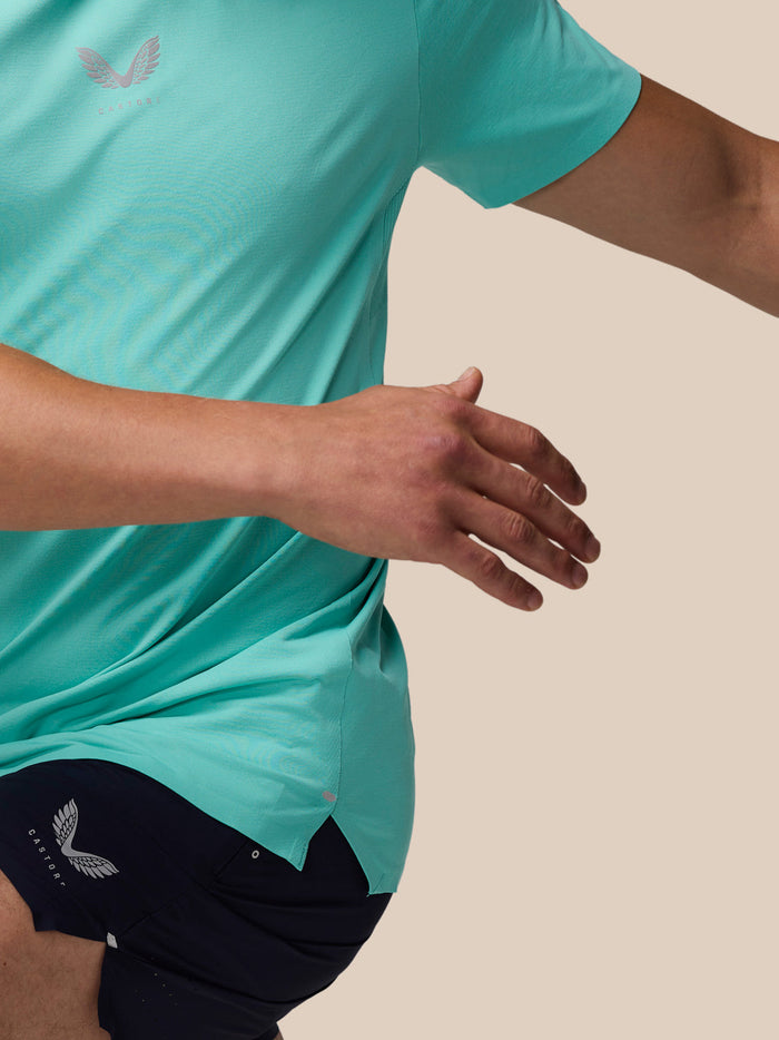 Close-up of left chest logo on light aqua Zone Training T-Shirt with side seam and hem detail