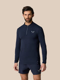 Male model in navy Zone Training 1/4 Zip Top with high neck, zip closure and logo on chest.