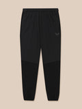 Black Flex Winterised Woven Joggers with elastic waist, zipped pockets and a small Castore logo on the thigh.