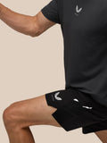 Close-up of a black Castore athletic shirt showing chest logo and a visible zipper
