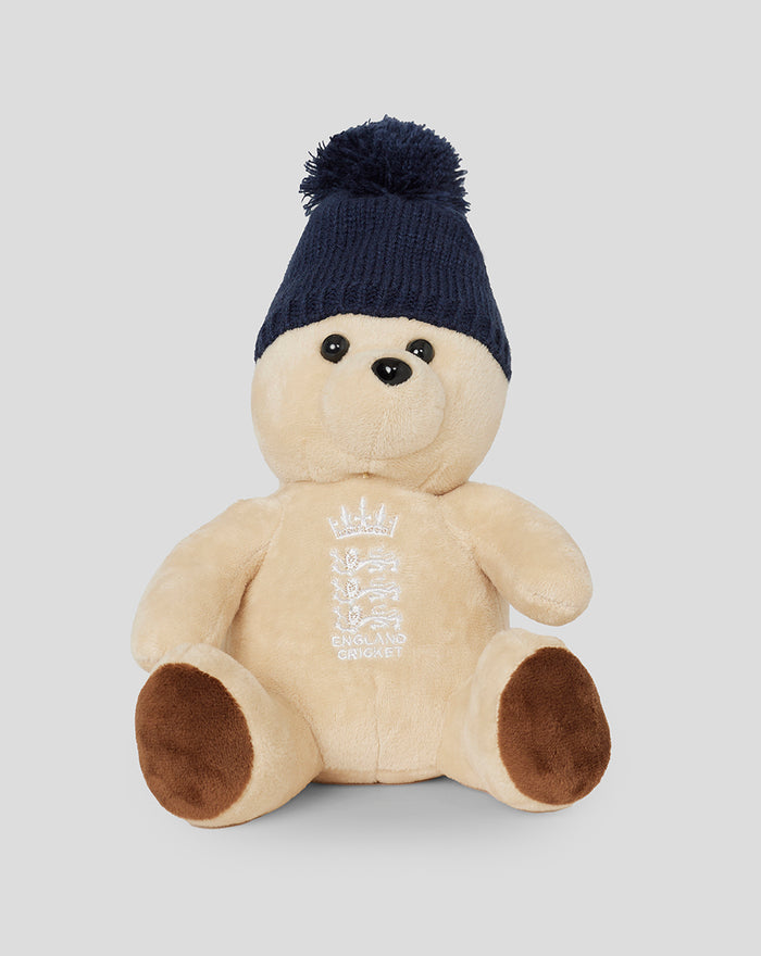 England cricket bear plush in cream fur wearing a navy knit beanie with England crest