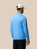 Back view of a man wearing the Golf Club Classic Quarter Zip Top in cool blue