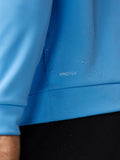 Close-up of blue ProTek water resistant fabric with water droplets on the Golf Club Classic top