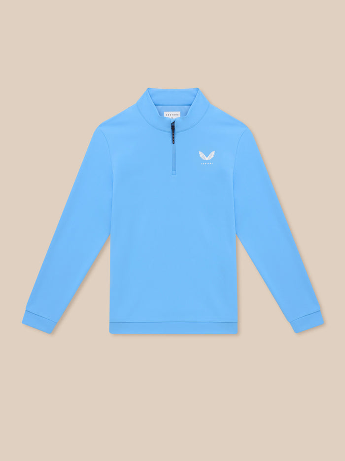 Close up of Castore Golf Club Classic 1/4 Zip Top in blue highlighting funnel collar and front zip with chest logo
