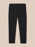 Front view of black Castore Golf Pinnacle Winter trouser with zip pocket and blue detailing