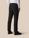Back view of black Golf Pinnacle Winter Trousers showing rear pockets and Castore branding.