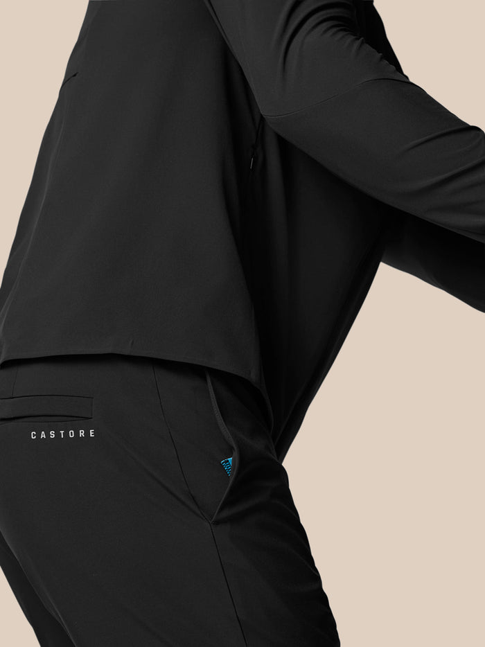 Back view of black Castore Golf Pinnacle Winter trouser showing back pocket and branding