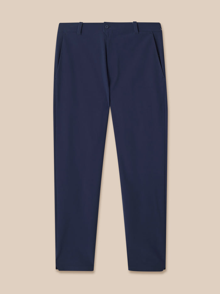 Front view of navy golf trousers laid flat showing waistband and pockets