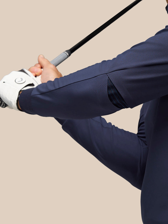 Close up of the Midnight Navy Pinnacle Performance Hoodie sleeve showing elasticated panels