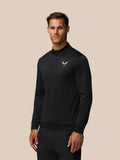 Male model wearing black Golf Club Classic 1/4 Zip Debossed Top with all over print and Castore logo