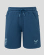 Front view of Junior travel fleece shorts in ensign blue with drawstring waist and Three Lions crest on the leg