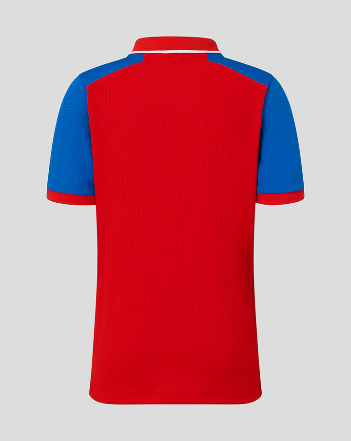 Back view of Junior 26/27 T20 Short Sleeve Shirt in red with blue shoulder panels
