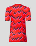 Back view of the Welsh Fire The Hundred 2026 short sleeve training T shirt featuring a bold red pink black geometric print