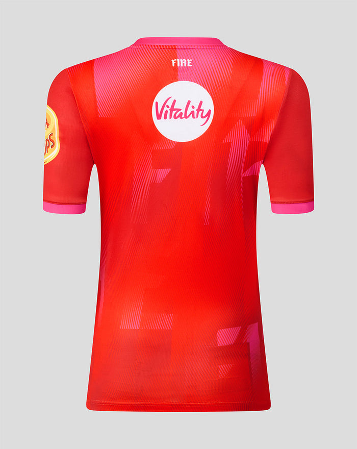 Back view of Welsh Fire 2026 women's short sleeve stretch jersey in red with pink cuffs and Vitality sponsor logo