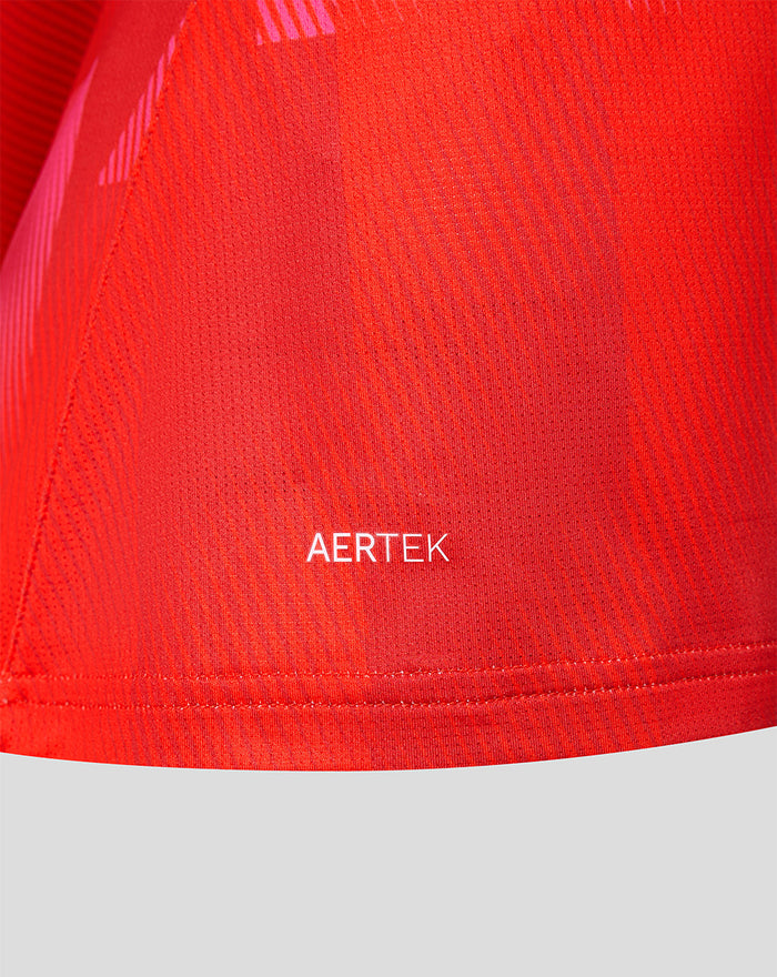 Red Welsh Fire jersey close up showing pink shoulder panels and the AERTEK label