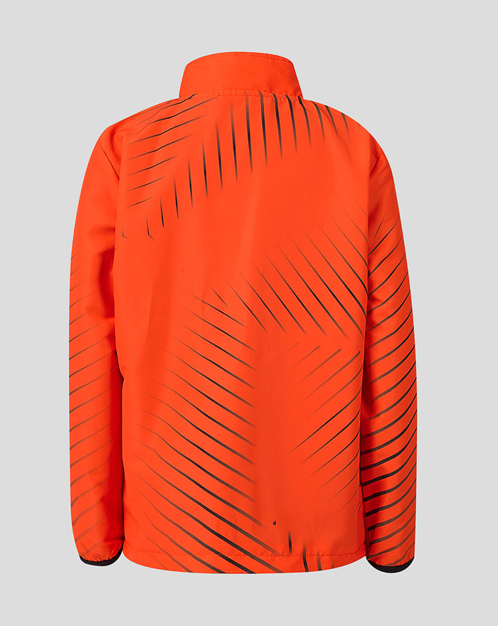 Back view of the orange Sunrisers Leeds The Hundred woven pre match jacket with diagonal black stripes
