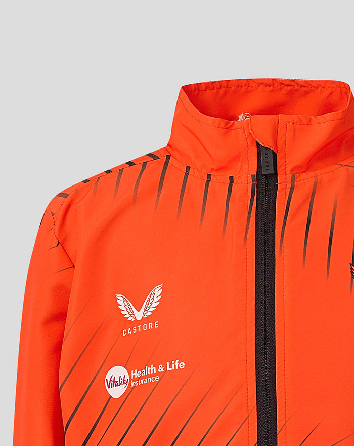 Orange jacket with chest crest and sponsor logos, black zipper down the front and diagonal stripes.