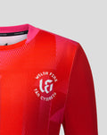 Junior Welsh Fire 2026 short sleeve stretch jersey with bold red geometric print and team crest