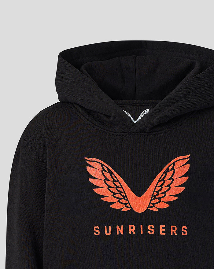 Juniors Sunrisers Leeds The Hundred Big Wings Hoodie in black with a large orange wing emblem on the chest