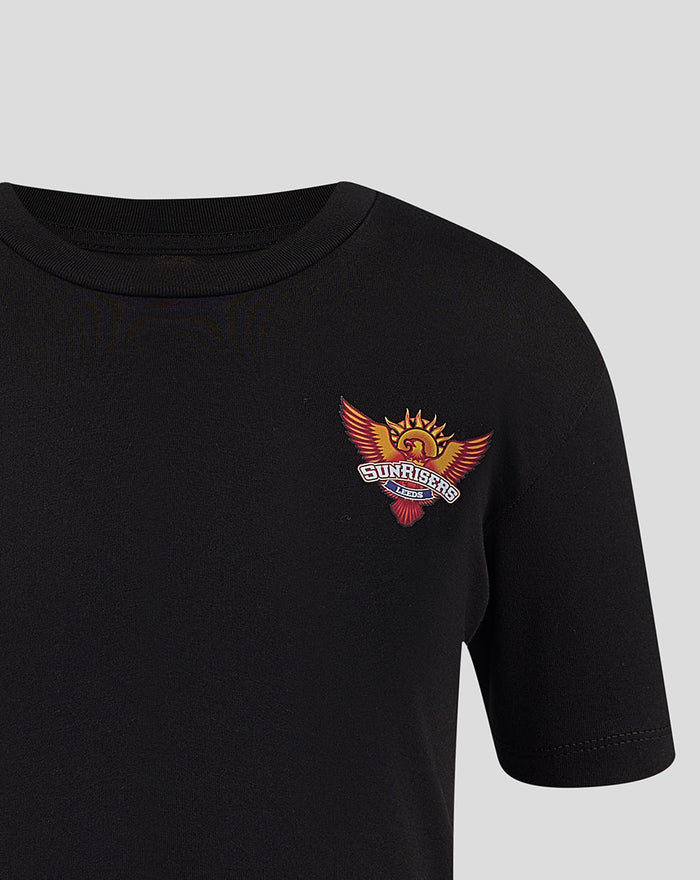 Front close up of a black junior T shirt with the Sunrisers Leeds Small Wings crest on the left chest