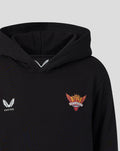 Close up of black juniors hoodie with Castore logo on the left chest and Sunrisers Leeds crest on the right under the hood