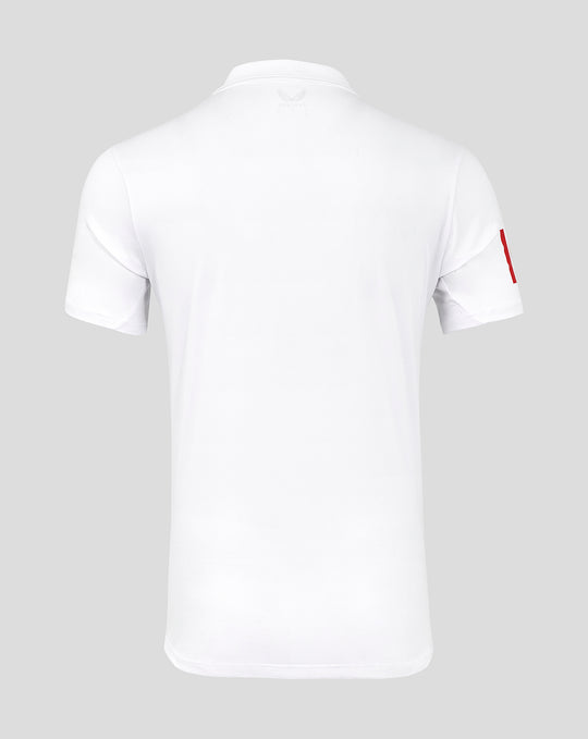 Back view of white polo shirt with subtle Castore logo at the neckline.