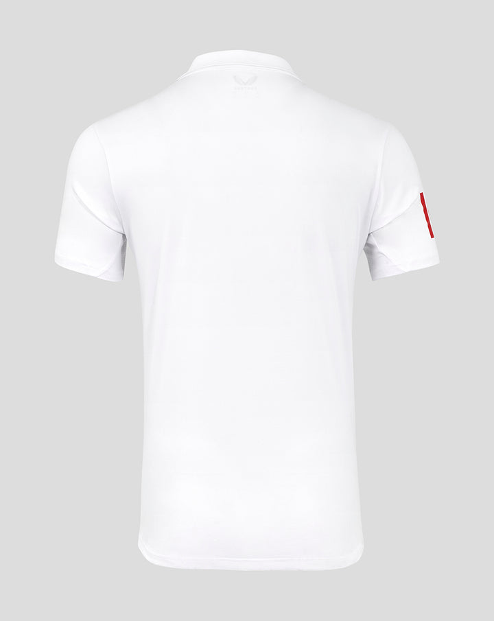 Back view of white polo shirt with subtle Castore logo at the neckline.