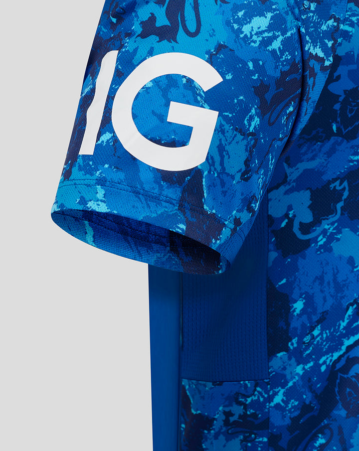 Close up of blue camo sleeve featuring a bold white graphic design.