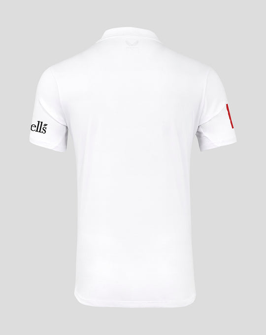 Front view of a white Test cricket shirt featuring a red collar detail and large Toyota sponsor logo.