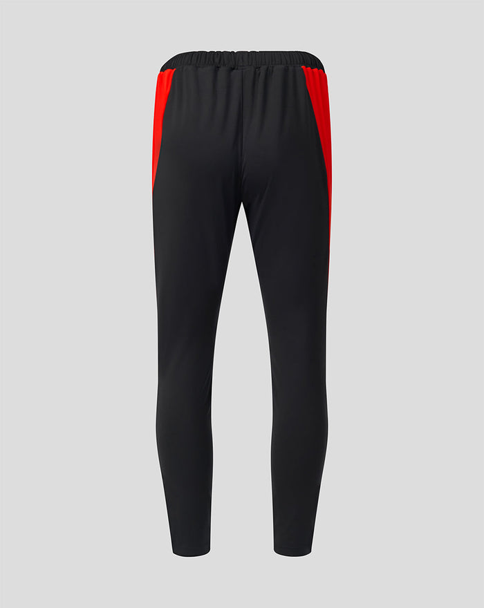 Rear view of black Welsh Fire 100 Sub Slim Fit pant with red side panels