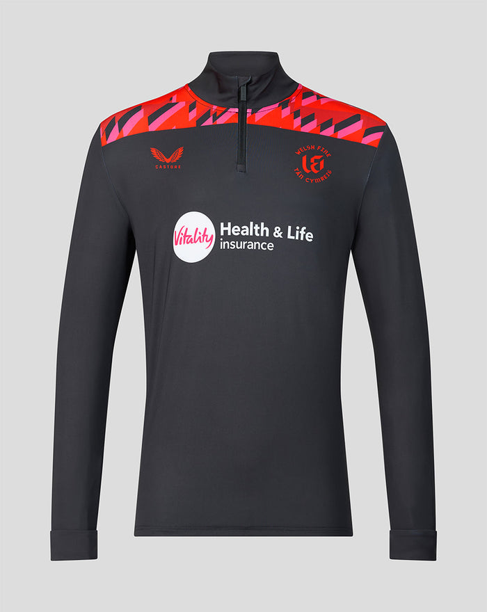 Front view of the Welsh Fire 2026 mens performance quarter zip top in dark color with red geometric shoulder panels, Vitality sponsor logo, and Welsh Fire crest.