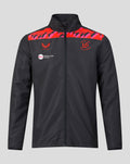 Front view of Welsh Fire 2026 mens woven pre match jacket featuring red geometric shoulder panel and crest on chest.