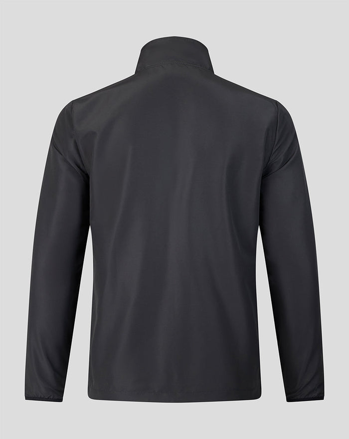 Back view of a dark Welsh Fire The Hundred 2026 woven pre match jacket