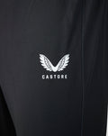 Close up of black Castore pant fabric with white wing logo