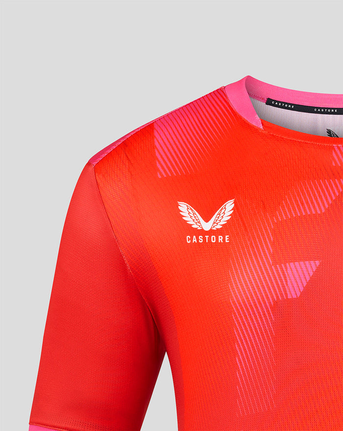 Red Welsh Fire The Hundred jersey with pink collar and white crest on the chest
