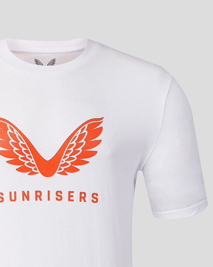 Close up of white Sunrisers Leeds The Hundred Big Wings T Shirt showing bold orange wing graphic on the chest area