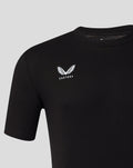 Close up of the white Castore wing logo on the black T shirt chest