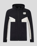 Black zip hoodie with a white patch on the left chest
