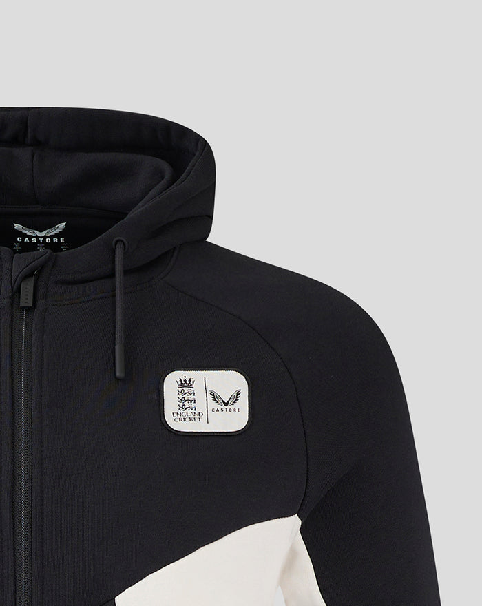 Chest patch on black full zip jacket showing England Cricket crest and Castore emblem
