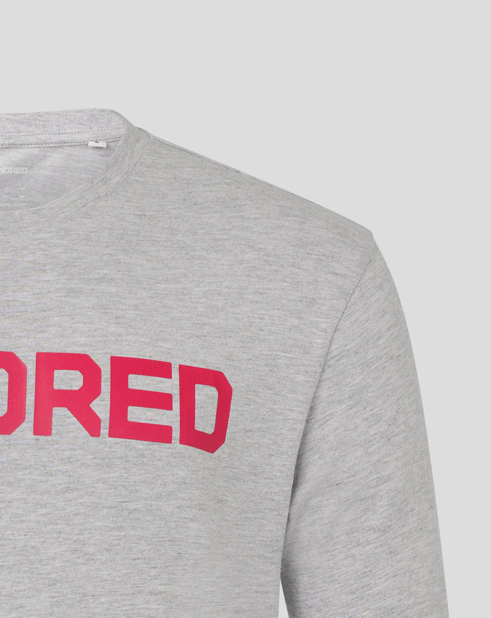 Shoulder and chest area of grey The Hundred T-shirt with bold pink logo
