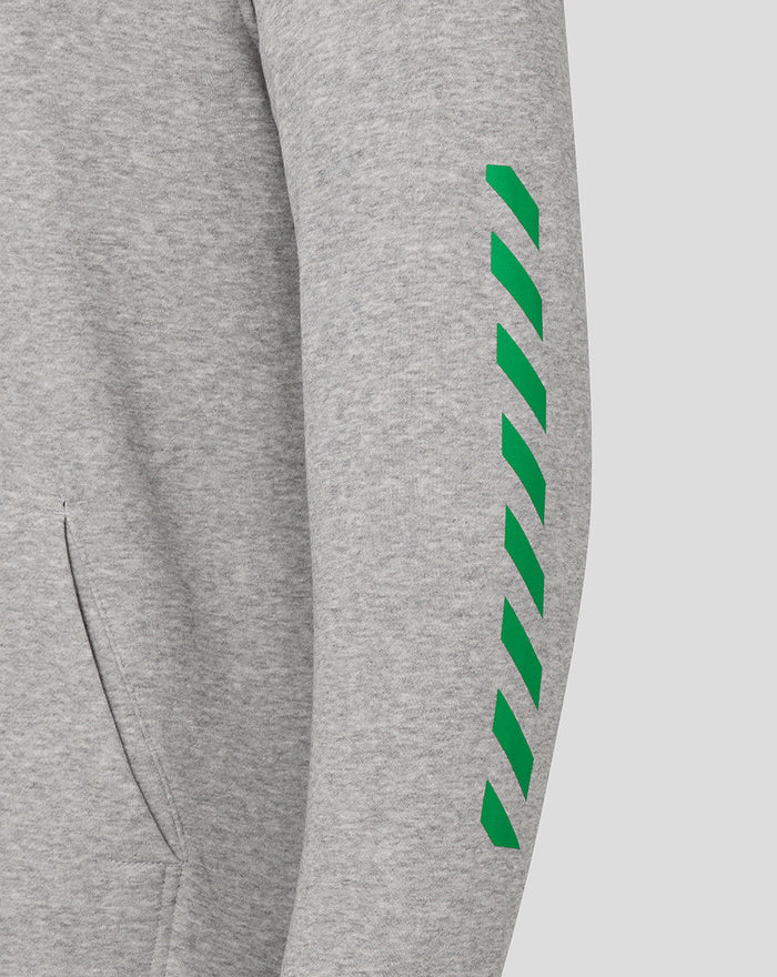 Grey hoodie sleeve with a green diagonal stripe pattern