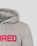 Close-up of grey hoodie front displaying a bold pink HUNDRED graphic across the chest.