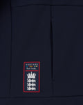 Navy hoodie front lower panel featuring Castore Paul Smith label patch with crest design