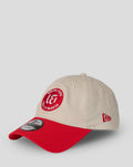 Beige New Era 9Twenty cap with red curved visor and Welsh Fire crest patch on the front