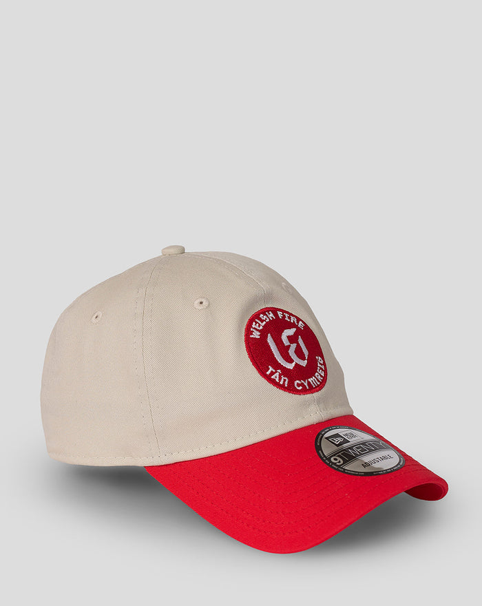 Rear angle of beige cap showing The Hundred patch on the back and the adjustable strap buckle