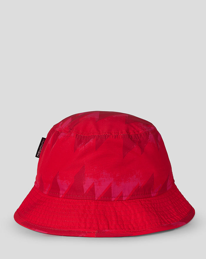 Red all over print bucket hat with a geometric pattern and a side New Era label.